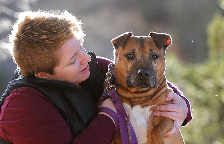 Adopter Rachel Johnson with Oscar the Vicktory dog