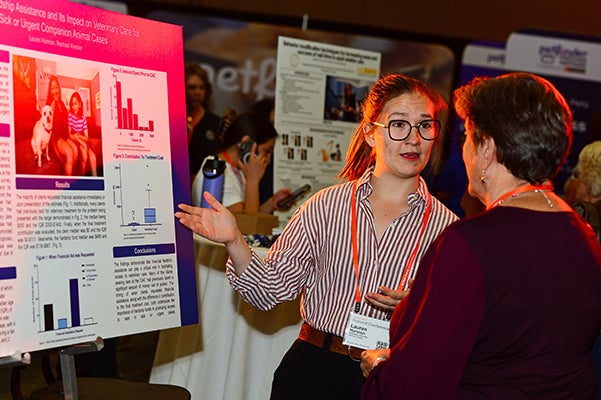 Person at a vendor booth at the Best Friends National Conference