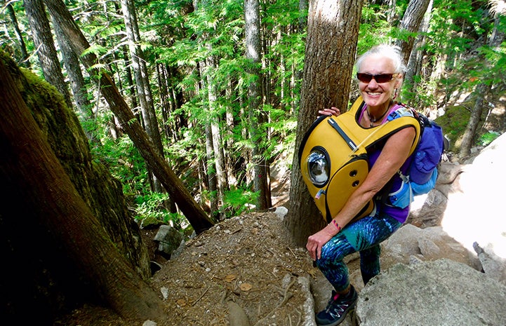Tina with Buddha in his cat backpack with a big porthole for him to gaze through during hikes