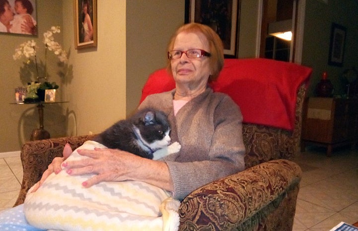  As soon as her grandmother sat down, Gloria the cat jumped up and sat down next to her
