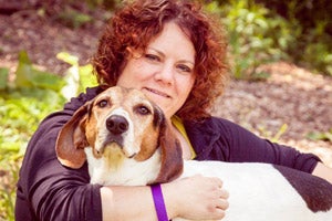 Denise Bitz from Brother Wolf Animal Rescue with a dog