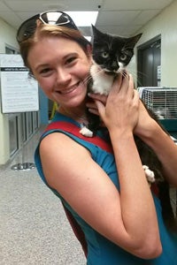 Lemonade the cat (pictured here with her new mom) is among 99 adult cats and 131 kittens who found homes