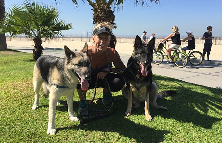 Volunteer dog walker Lotta Nilsson-May on a dog walk at the beach