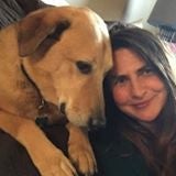 Aimee St Arnaud with brown dog