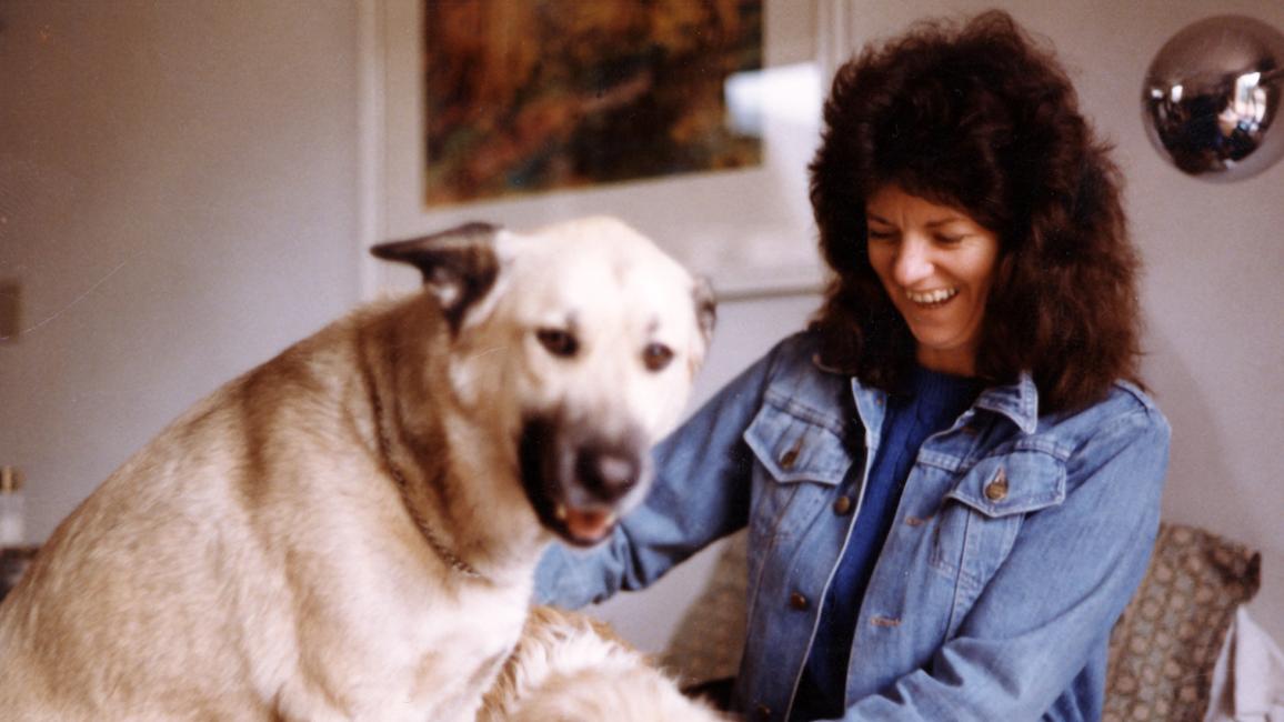Best Friends co-founder Celeste Fripp with a shepherd dog